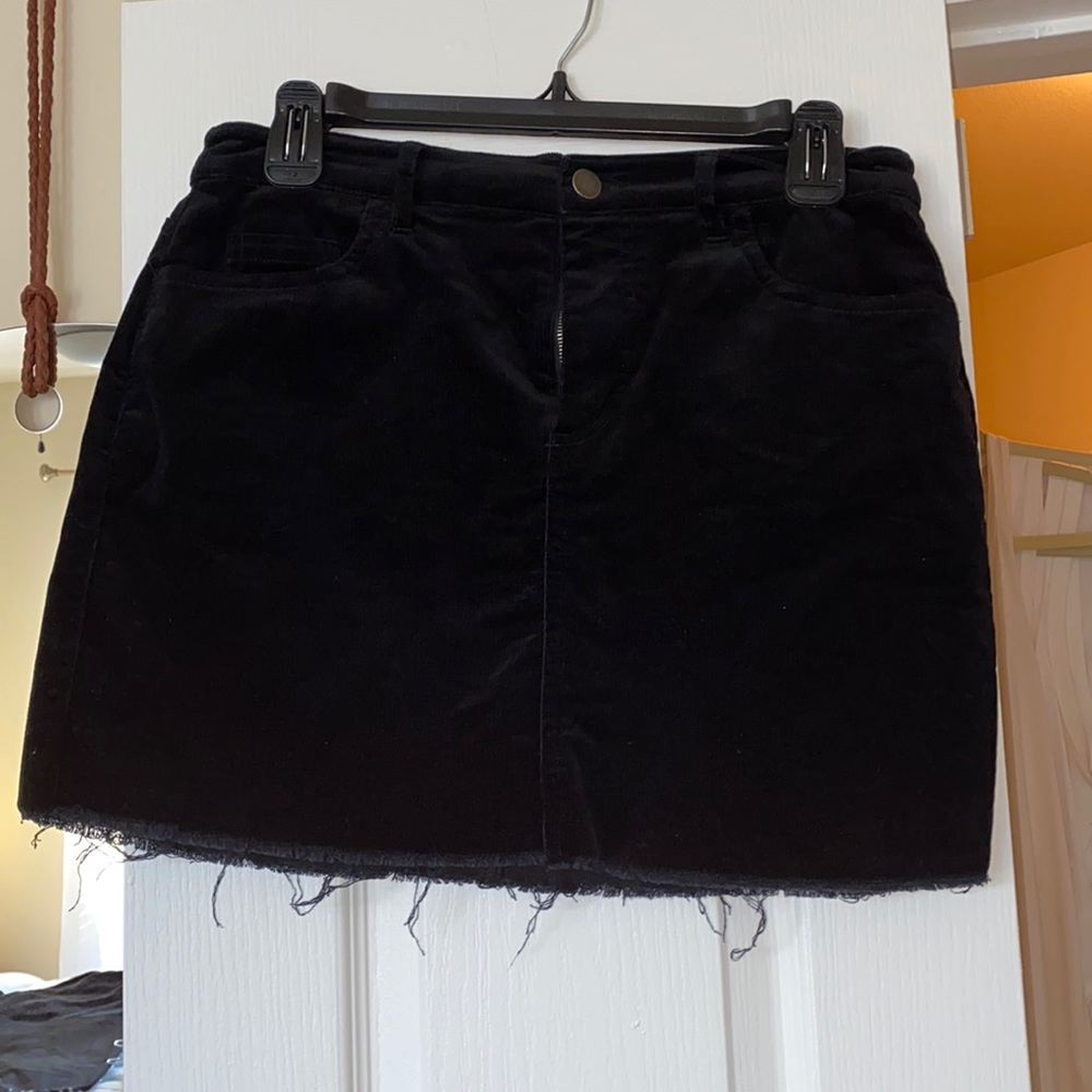 Forever 21 black corduroy mini skirt with distressed bottom